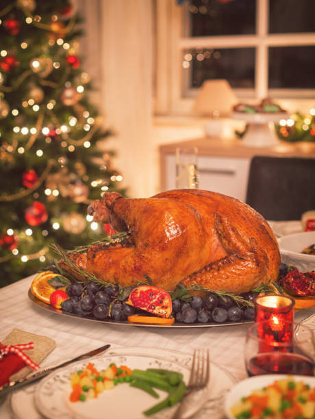 istock Traditional Stuffed Christmas Turkey with Side Dishes 866313932