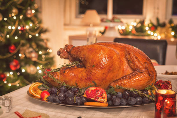 istock Traditional Stuffed Christmas Turkey with Side Dishes 866314102