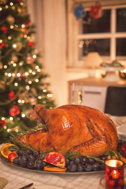 istock Traditional Stuffed Christmas Turkey with Side Dishes 866314282