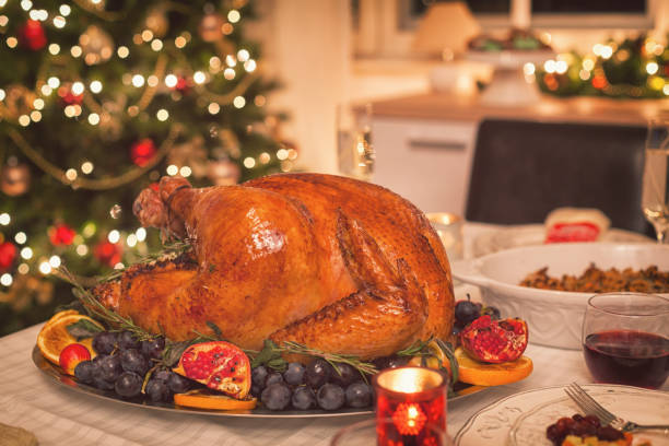 istock Traditional Stuffed Christmas Turkey with Side Dishes 866314306