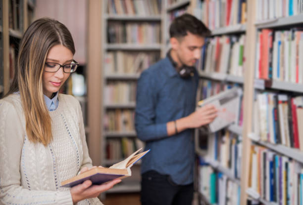 istock Young teenagers in library 866318626
