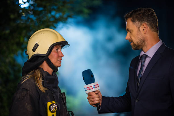 istock Reporter covering fire accident 866328758