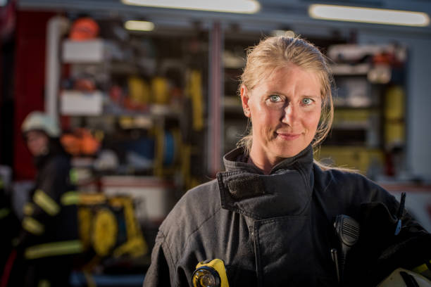 istock Portrait of a female firefighter 866328894