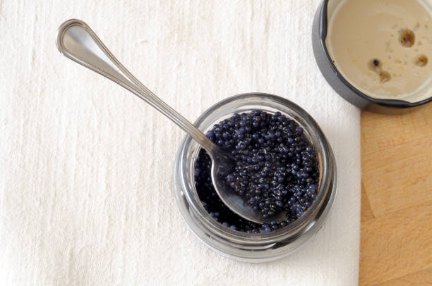 istock jar of black lumpfish eggs on the table 866328898