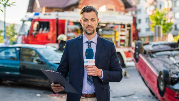 istock Reporter covering traffic disaster 866329214