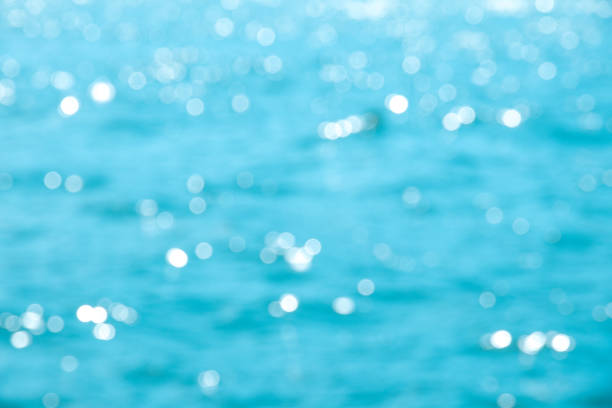 istock Texture of blue green blur sea background and reflection 866332804