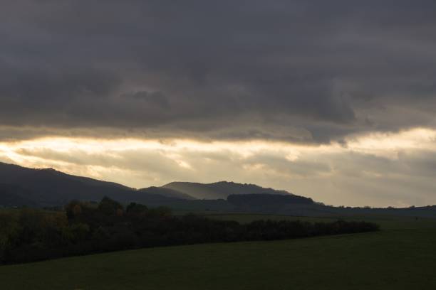istock Sunrise and sunset over the hills and town. 866335348