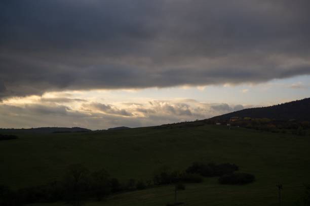 istock Sunrise and sunset over the hills and town. 866335372