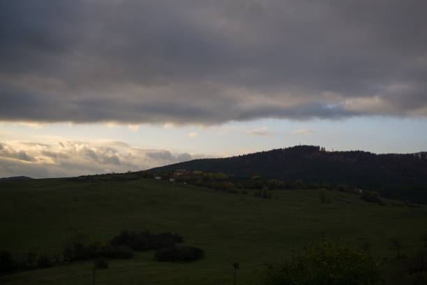 istock Sunrise and sunset over the hills and town. 866335376