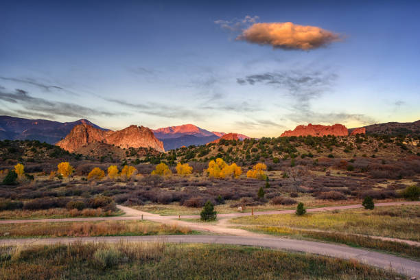 Morning Garden Garden of the Gods Park in Colorado Springs, Colorado. The Garden of the Gods Park is unique due to the upright sandstone peaks found throughout the park composed entirely of sedimentary rock layers carved by erosion.' colorado springs photos stock pictures, royalty-free photos & images