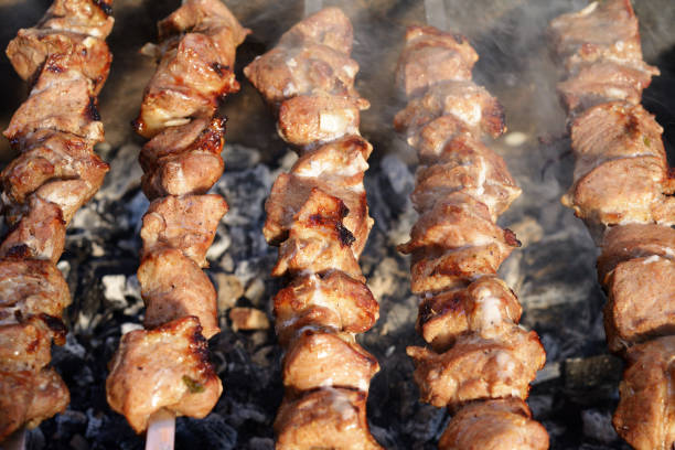istock Shashlik grilled on skewers close-up 866335768