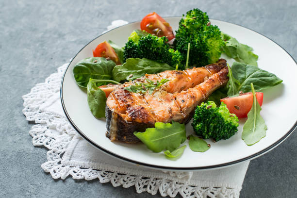 istock Grilled salmon steak and vegetables 866337412