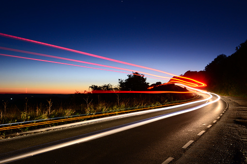 Car headlights streaking across the downs at dusk provide photographic opportunities to capture light trails.