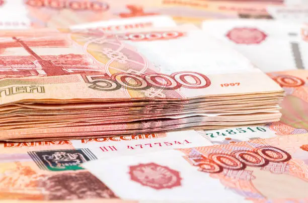 Photo of Stack of five thousandths banknotes of russian roubles close up