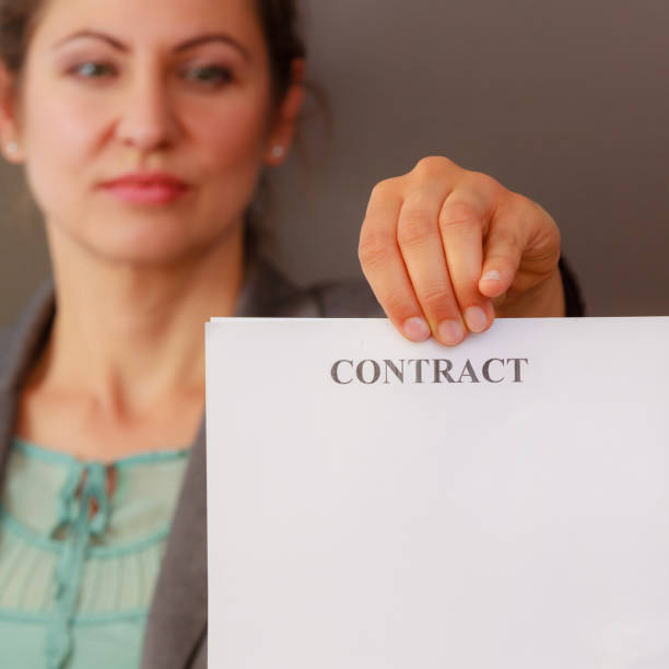 istock Business woman showing contract 866347820