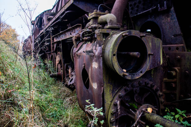Old rusty trains. Old abandoned track, siding with dirty old trains. Old railway tracks