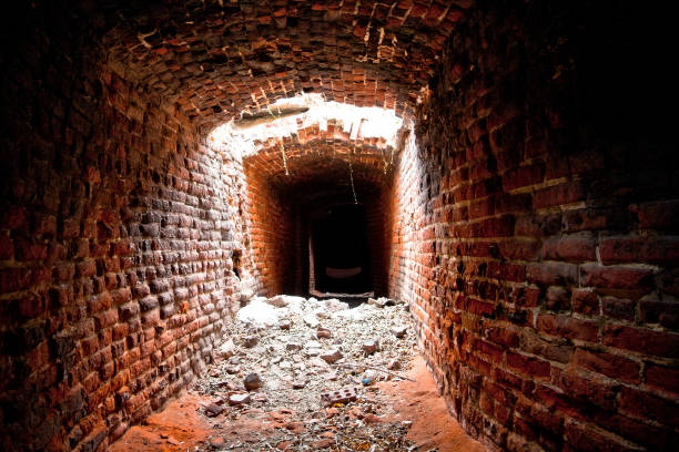 istock An abandoned and collapsed historic underground passage made of red brick 866357518