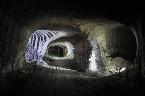 istock Chalk mine tunnel with traces of drilling machine 866360644