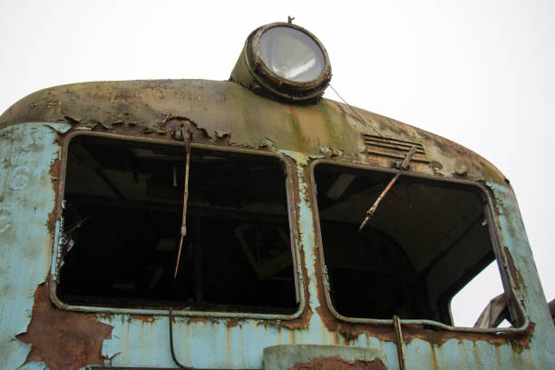 Old rusty trains. Old abandoned track, siding with dirty old trains. Old railway tracks