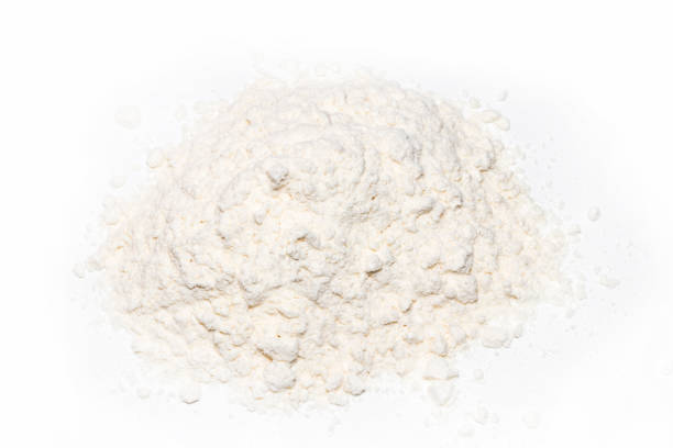 istock Pile of wheat flour isolated on white background 866361622