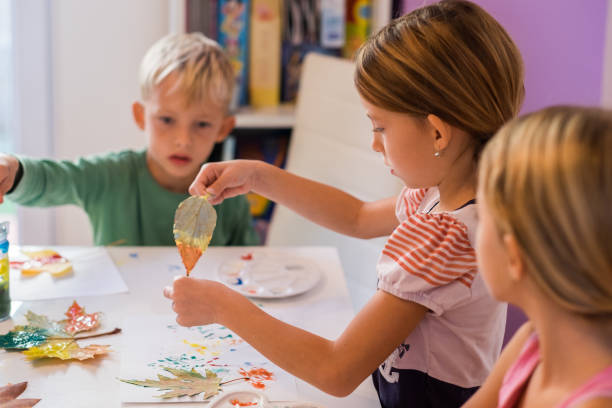 istock Children enjoy painting 866361842