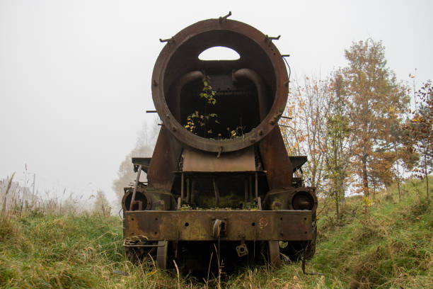 istock Old rusty trains. Old abandoned track, siding with dirty old trains. Old railway tracks 866364380