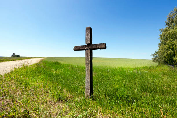 Wooden cross, close-up field