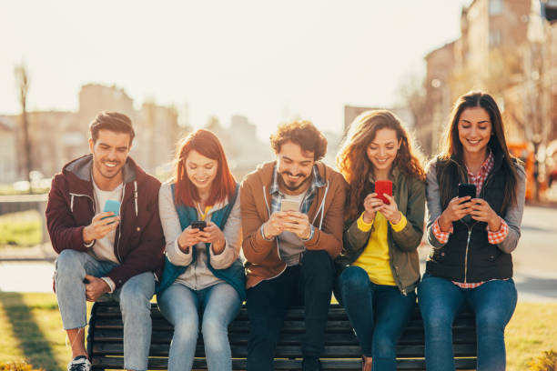 istock People texting in the city 866371626