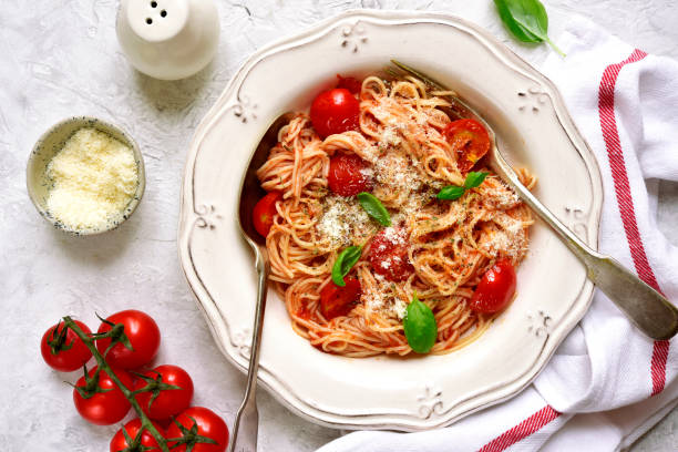 istock Spaghetti with cherry tomatoes in a red sauce 866371652