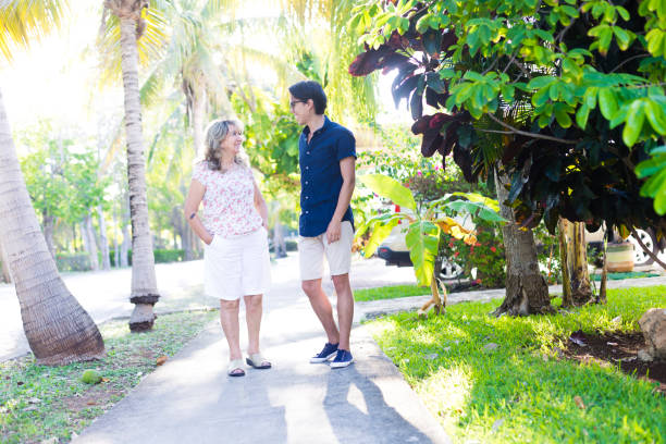 istock Grandama walking with her grandson 866371684