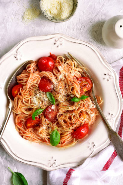 istock Spaghetti with cherry tomatoes in a red sauce 866371700