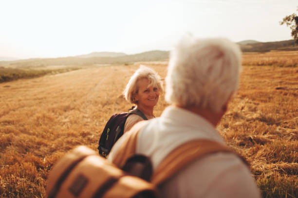 istock Senior couple on a hiking trip 866375134