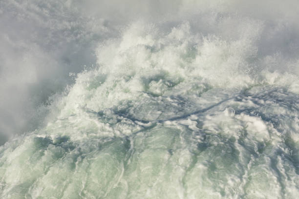 Abstract powerful churning water and rapids in Niagara River, Ontario, Canada.