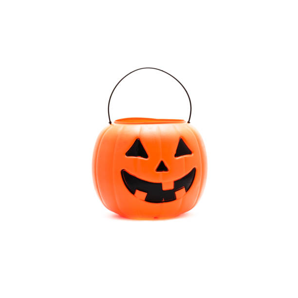 istock Studio shot Jack O' Lantern Halloween pumpkin pail isolated on white 866382590