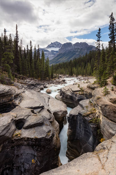 istock Mistaya Canyon Waterfall and Stream, Banff National Park 866383034