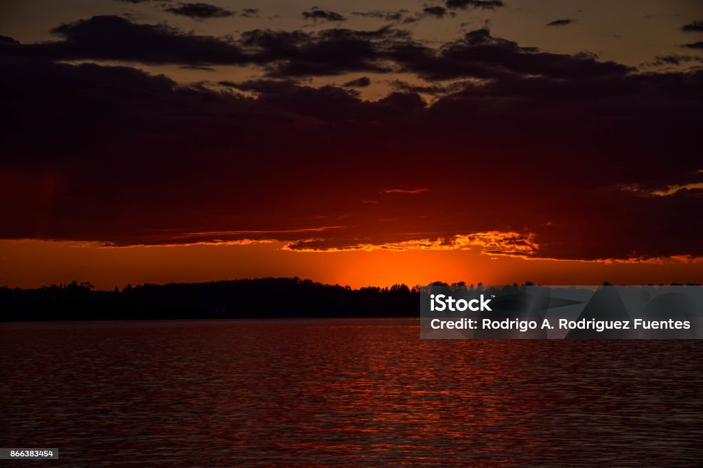 Sunset in upper Michigan Sunset in Elk Lake, Michigan Michigan Stock Photo