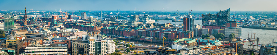 Panoramic aerial view across the UNESCO World Heritage Site of Speicherstadt to HafenCity and the Elbphilharmonie on the harbour waterfront of Hamburg, Germany’s vibrant second city.