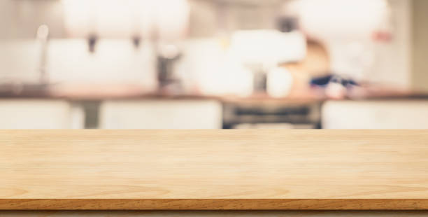 istock Empty plank wooden table top with blurred home kitchen,Mock up template for display or montage of your design,Banner for advertise of product,panorama view 866389784