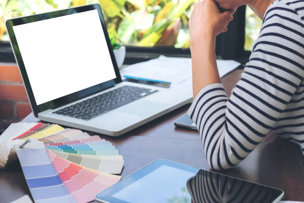 istock Creative creativity graphic designer working with graphics tablet,laptop and smart phone, colour chart at workplace on wooden desk , colour ideas style concept 866396878