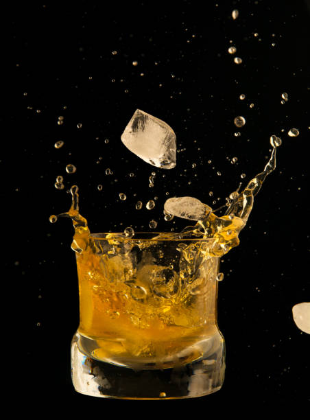 istock ice falling on a glass of whiskey 866396944