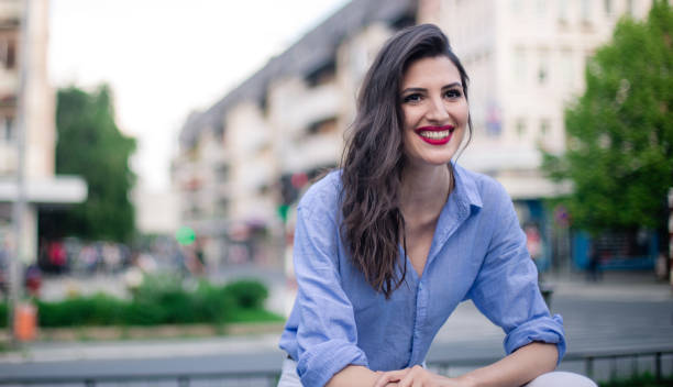 istock Woman sitting on bench 866396998