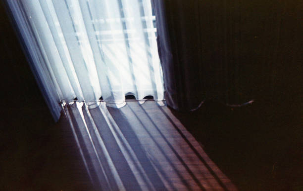istock light from sunrise in morning at window 866397440