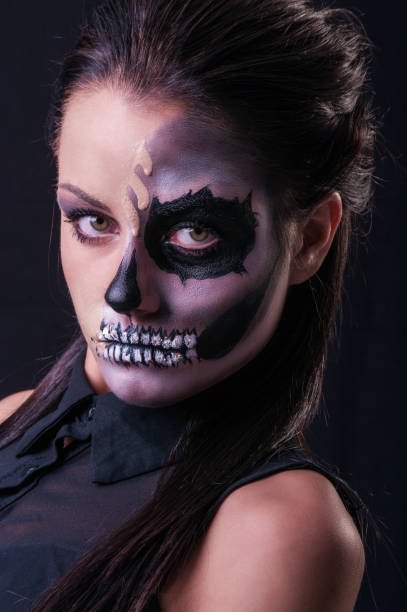 istock beautiful woman with make-up skeleton 866397880