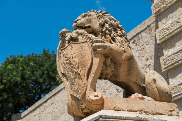 Statue of a lion at the entrance in Mdina silent city fortification, Malta