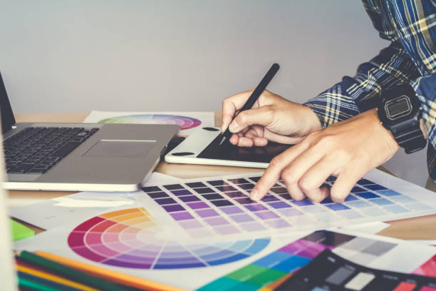 istock Designer graphic creative  working on Mouse pen,laptop in  office 866408404