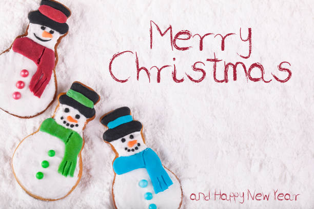 istock Christmas Gingerbread snowmen on the snow 866416066