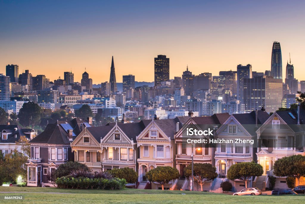 Alamo square and Painted Ladies with San Francisco skyline San Francisco - California, Alamo Square, Urban Skyline, City, Famous Place San Francisco - California Stock Photo