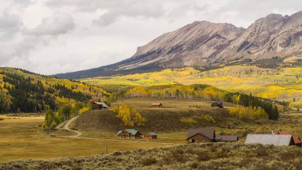 istock Small village with mountain and autumn colours 866422940