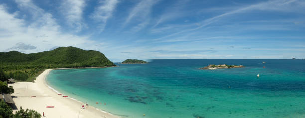 istock White sand beach and clear blue ocean with blue sky 866425850