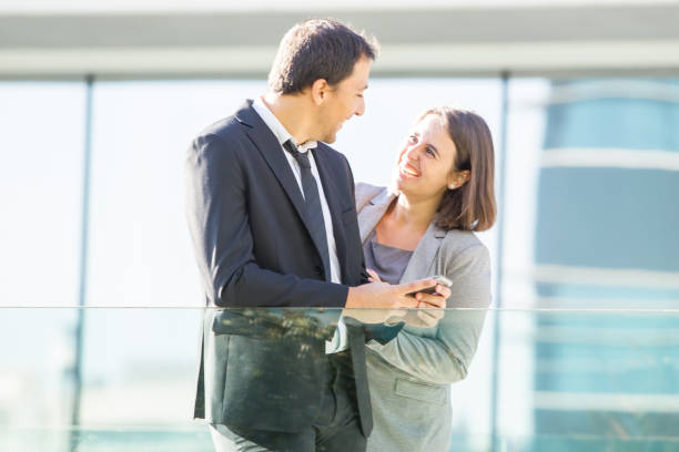 istock Laughing Middle-aged Business People Outdoors 866434126